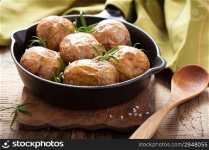 baked potatoes in black pan