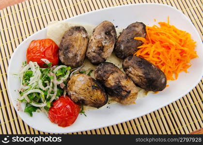 Baked potatoes in the plate