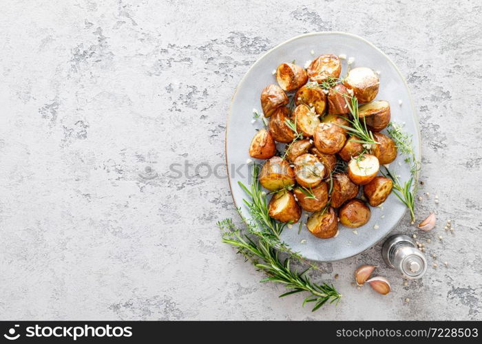 Baked potatoes with rosemary, thyme and garlic