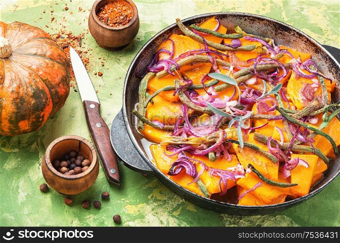 Baked pumpkin with red onion and vigna.Stewed vegetables. Homemade baked pumpkin