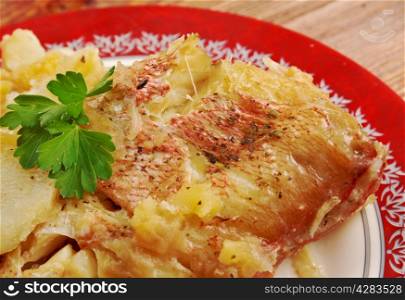Baked red grouper with potato and apple