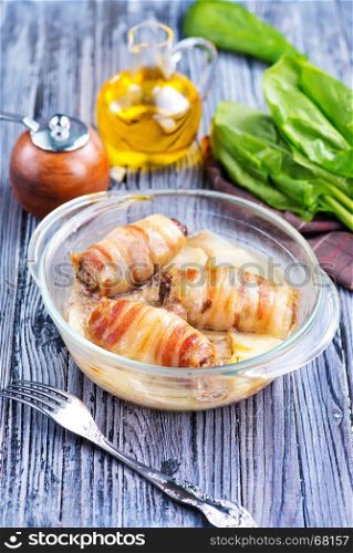 baked roll with bacon and cheese in bowl
