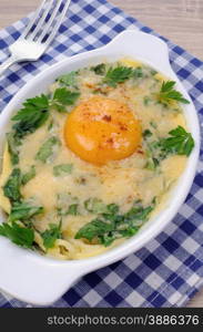 baked spinach and cheese with egg yolk
