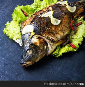baked stuffed fish. whole fish carp baked in the oven