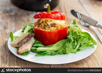Baked stuffed peppers with meat sauce and cheese. Baked stuffed peppers with meat sauce and cheese.