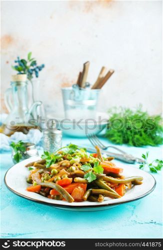 baked vegetables on plate, salad with fried vegetables