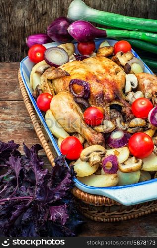 baked whole chicken in vegetables