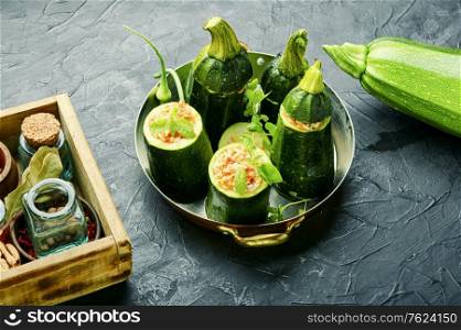 Baked zucchini stuffed with vegetables and rice.Summer food. Zucchini stuffed with rice