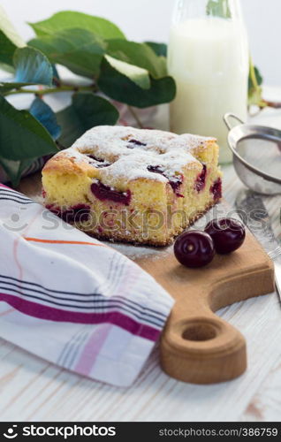 bakery - Cherry pie, milk and cherries on the table