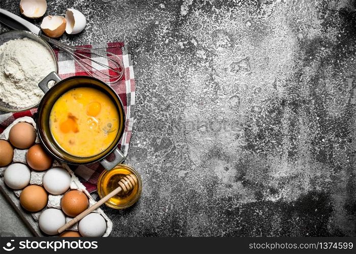 Baking background. A variety of ingredients for baking on rustic background.