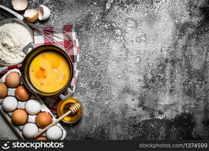 Baking background. A variety of ingredients for baking on rustic background.