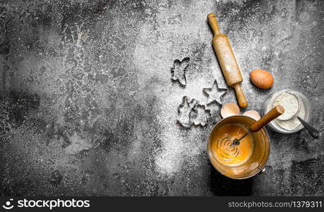 Baking background. Ingredients for the preparation of the biscuits for baking. On rustic background.. Baking background. Ingredients for the preparation of the biscuits for baking.