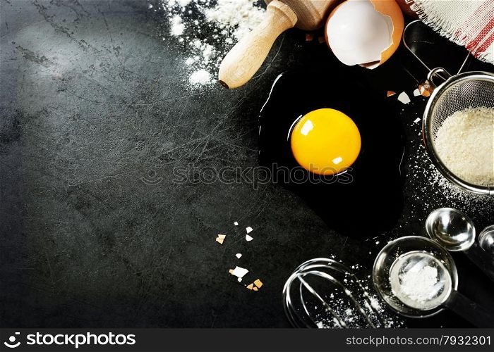 baking background with raw eggs, sugar and flour
