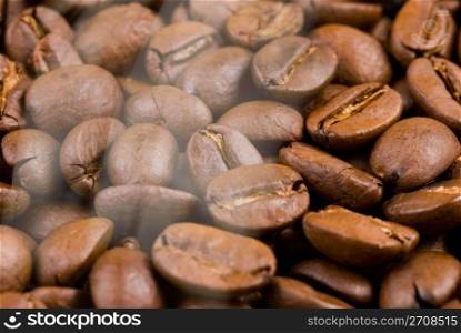 Baking coffee bean with smoke, ingredient of coffee drink.