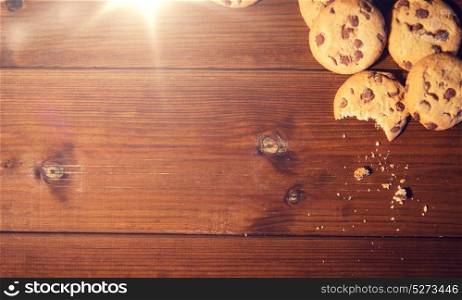 baking, cooking , holidays and food concept - close up of oat cookies on wooden table. close up of oat cookies on wooden table