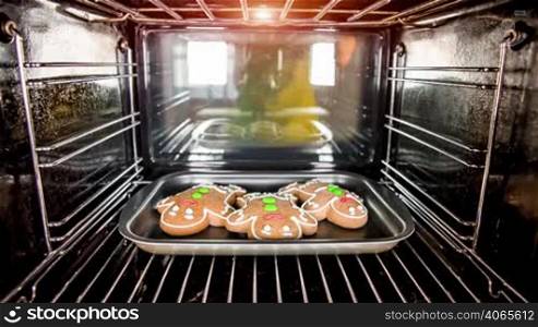 Baking Gingerbread man in the oven, view from the inside of the oven. Cooking in the oven.