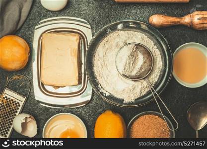 Baking ingredients for cookies and kitchen tolls, top view