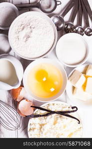 Baking ingredients for cottage cake on the table