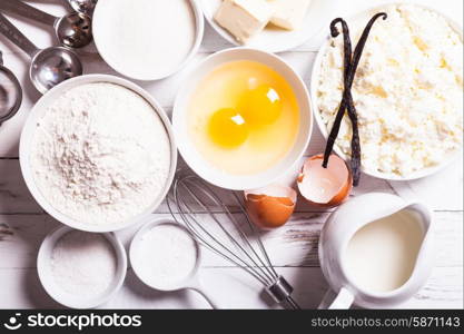 Baking ingredients for cottage cake on the table