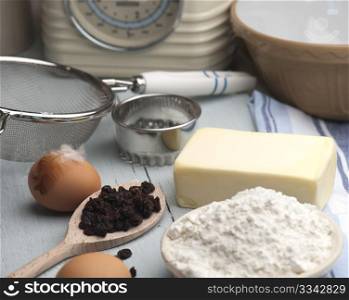 Baking Ingredients Laid Out On A Wooden Kitchen Table