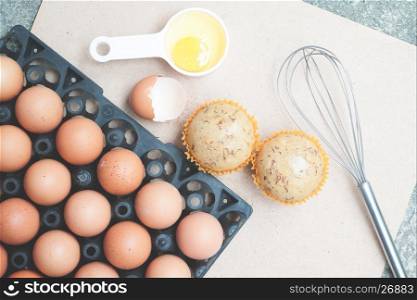 Baking ingredients with eggs and banana cup cake