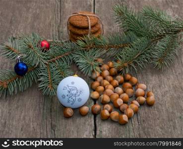 baking, nutlets, Christmas tree decorations and coniferous branch, still life, subject Christmas and New Year