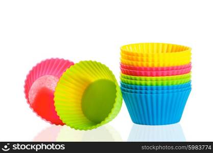 baking silicone cups for cupcakes or muffins on white background