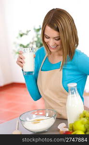 Baking - Smiling woman with healthy ingredients prepare organic dough