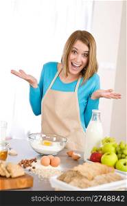 Baking - Surprised woman prepare fresh ingredients for healthy cake dough