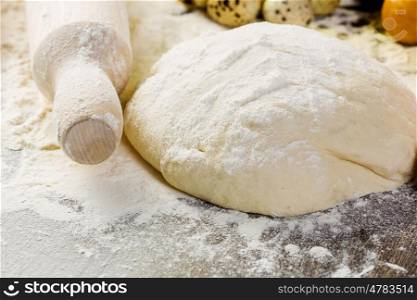 Baking. White bread drought and flour on kitchen table
