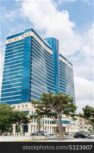 Baku - JULY 18, 2015: Hilton Hotel on July 18 in Baku, Azerbaijan. Baku has many modern hotels. Baku - JULY 18, 2015: Hilton Hotel on July 18 in Baku, Azerbaija