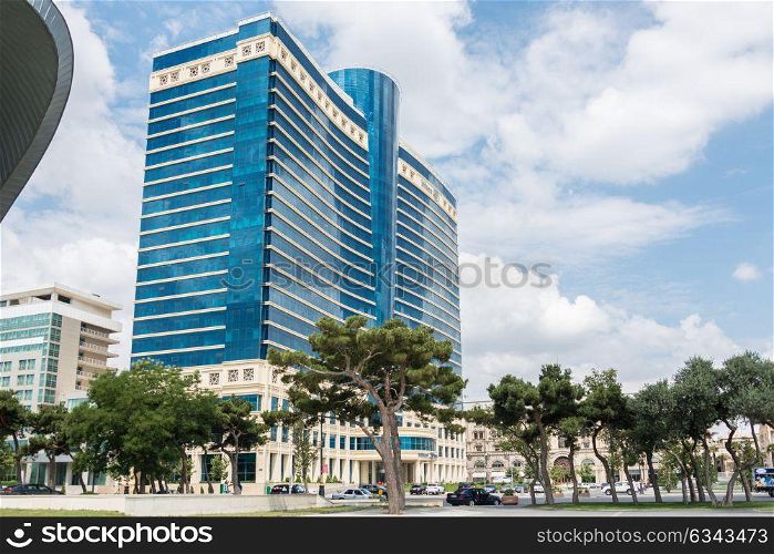 Baku - JULY 18, 2015: Hilton Hotel on July 18 in Baku, Azerbaijan. Baku has many modern hotels. Baku - JULY 18, 2015: Hilton Hotel on July 18 in Baku, Azerbaija
