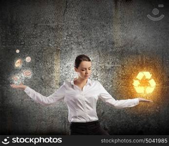 Balance concept. Image of businesswoman balancing with items on palms