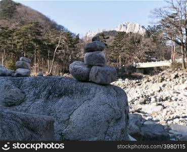Balance stones standing on top of each other in mountains Seoraksan, Seoraksan