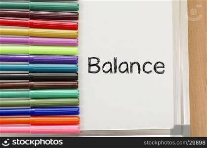 Balance text concept over whiteboard background