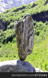 Balanced stones near the caucasus mountain river