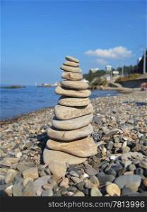Balanced stones on the seashore. Black Sea seaside