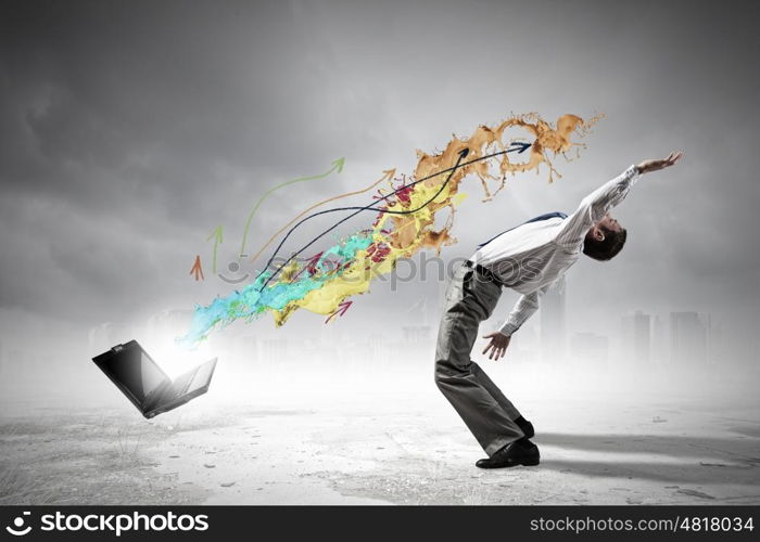 Balancing young man evading from explosion of ideas. Businessman evades splash ideas