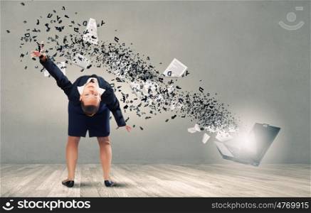 Balancing young woman evading from explosion of ideas. Businesswoman evades splash ideas