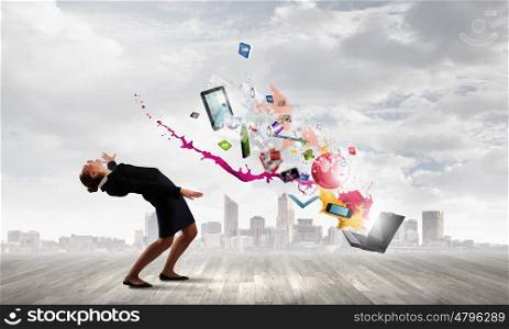 Balancing young woman evading from explosion of ideas. Businesswoman evades splash ideas