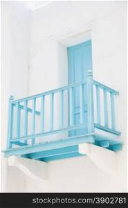 Balcony door walk out terrace of Hotel Blue. Blue wooden balcony