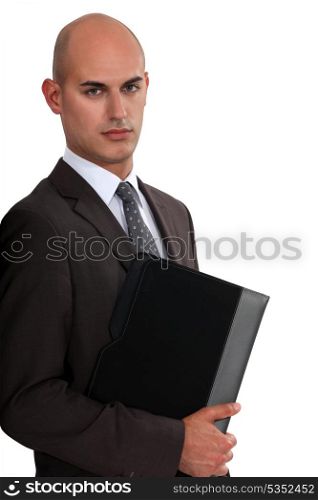 Bald businessman holding folder