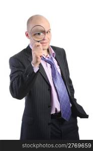 Bald businessman in a suit with a magnifying glass. Izolirovono on a white background