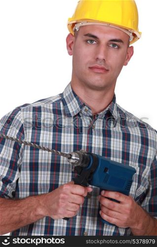 bald carpenter holding power drill