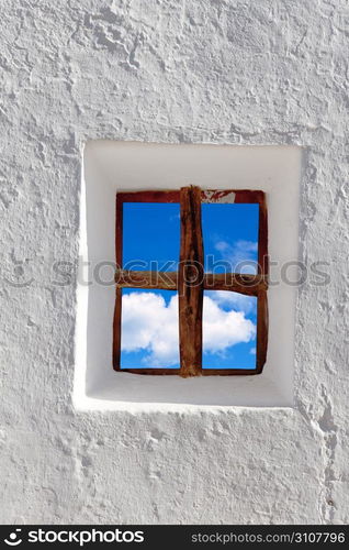 Balearic islands blue sky view through whitewashed house window