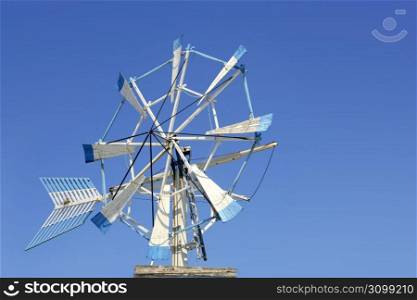 Balearic islands Formentera old traditional wind mill over blue sky