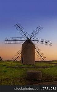 balearic islands windmill wind mill sunset in Formentera La Mola