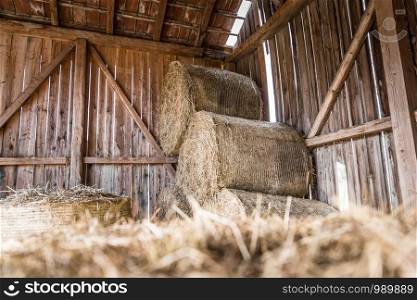 Bales of hay/straw on a farm, countryside, indoors