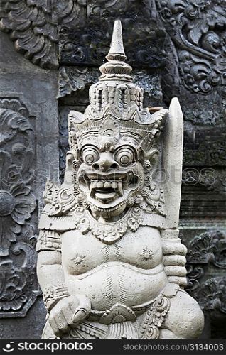 BALI, INDONESIA - FEBRUARY 17: Ornate monster statue at Ulun Danu temple on February, 17, 2011, Bali, Indonesia