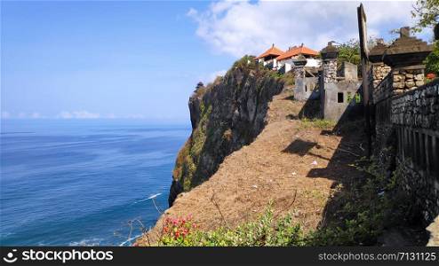 Balinese Hindu sea temple located in Uluwatu with magnificent location, perched on top of a cliff